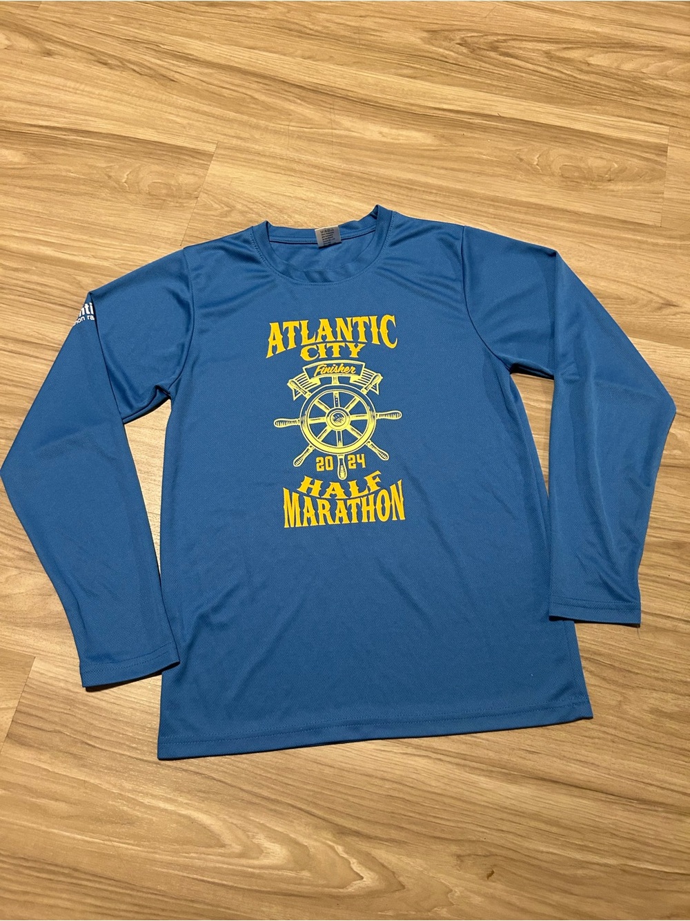 2024 Atlantic City Half Marathon blue long sleeve shirt with yellow graphic